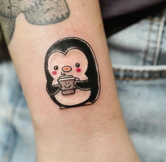 Pinguin met een kopje koffie